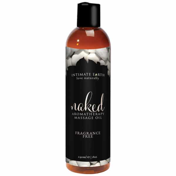 Bottle of Naked Fragrance Free Massage Oil with black label with naked branding